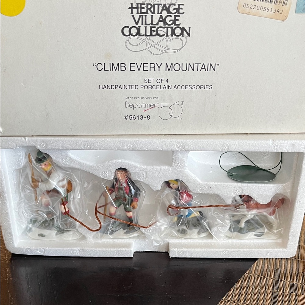 Dept  56 Heritage Village Figurines climb every mountain set of four